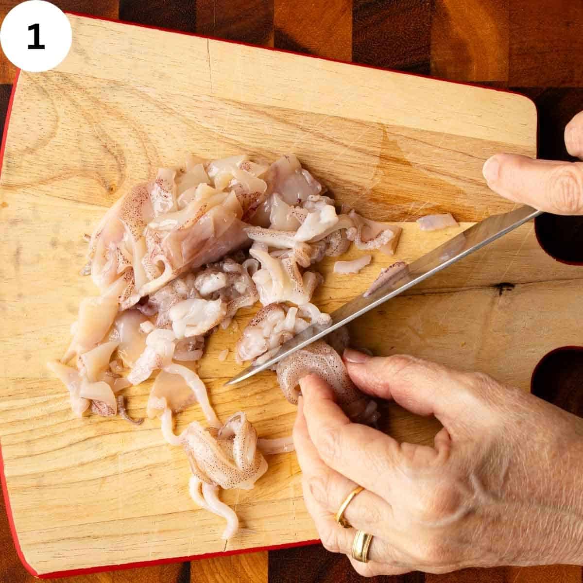 Squid tentacles being chopped.