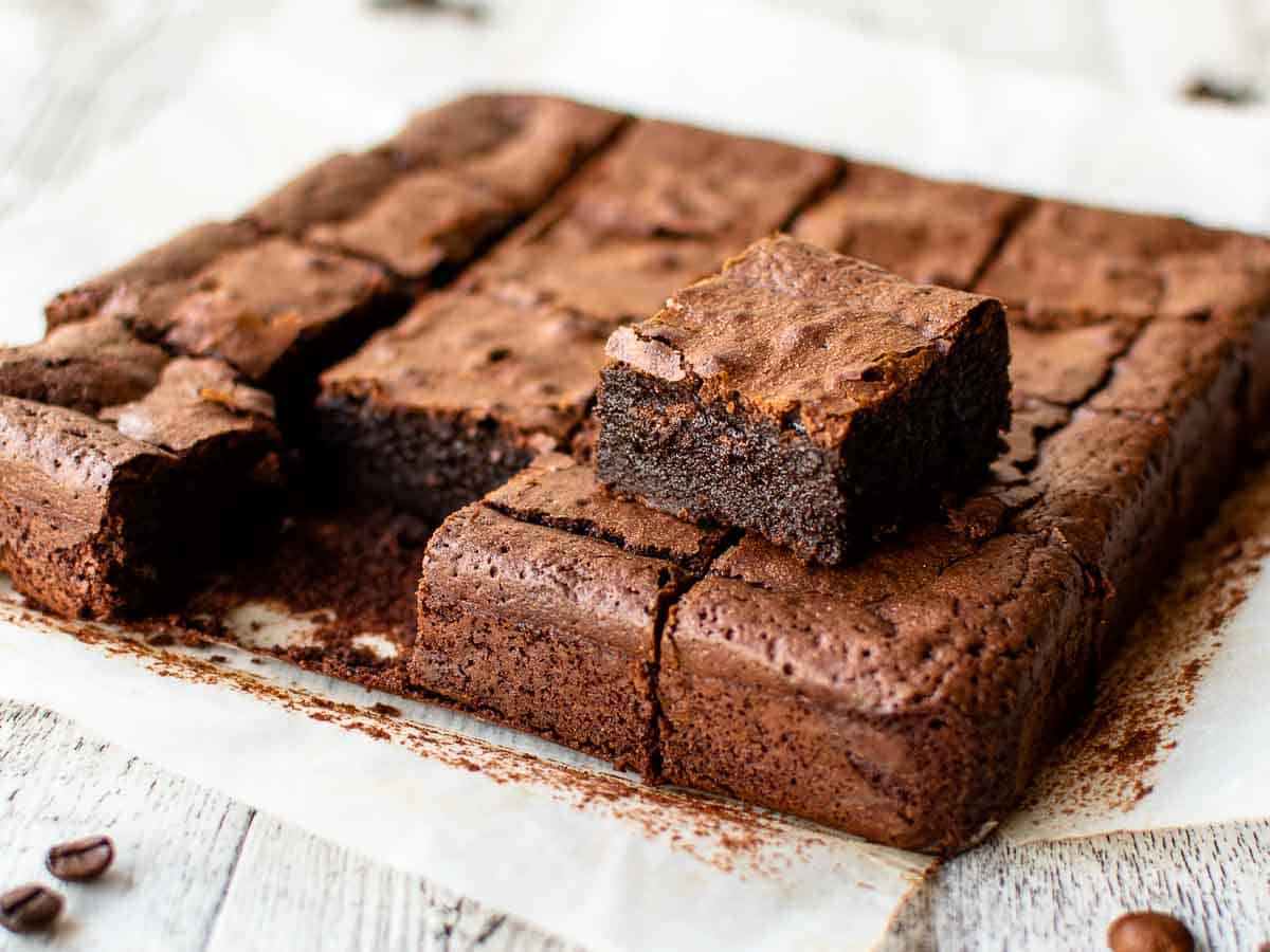Brownies cut into squares with one removed and place on top of the others.