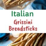 Bunch of grissini breadstick on wooden board.