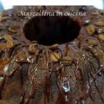 image with text overlay. text reads "homemade moist mocha cake'. image is mocha cake drizzled with chocolate and coffee beans.