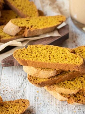 Pumpkin Biscotti stacked with more behind.