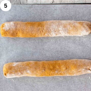 Two logs of orange brown dough.