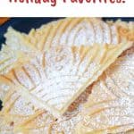 image with text. text reads "lemon pizzelle holiday favorites". image is Lemon pizzelle dusted with powdered sugar on a black plate.