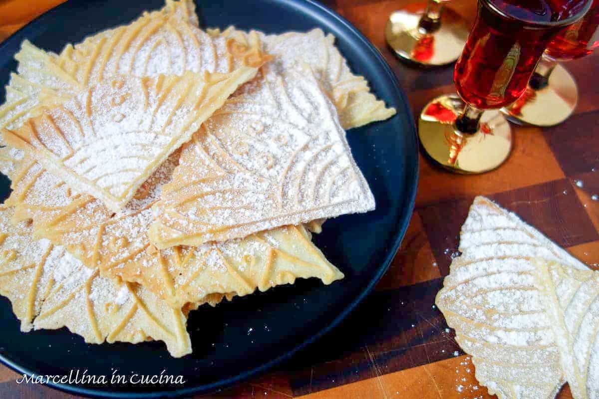 wafer cookies on black plate