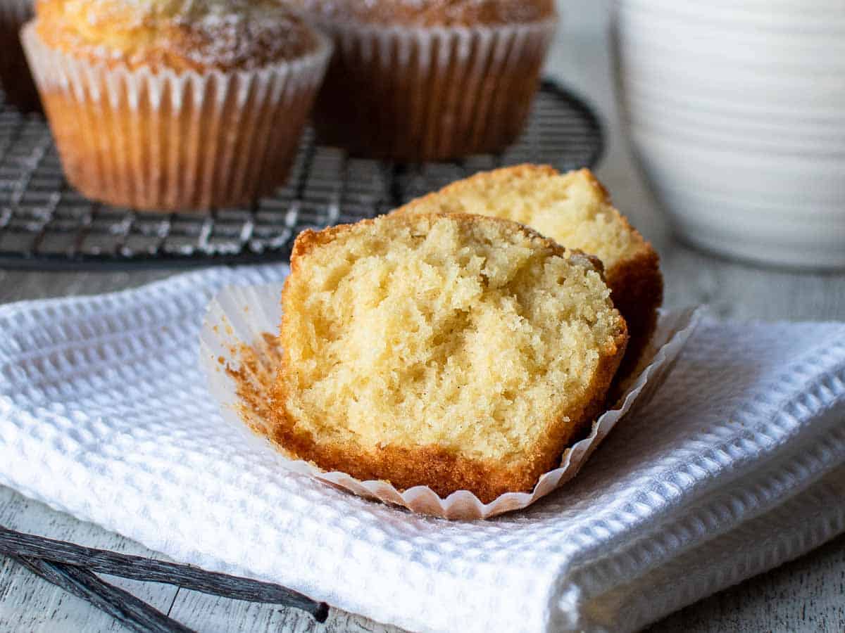 A muffin split in half showing the inside texture.