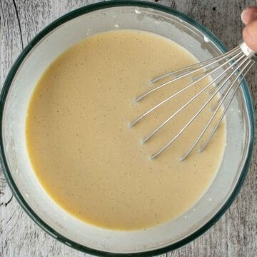 Pale yellow thick liquid in a glass bowl.