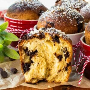 Chocolate Panettone broken in half showing the inside crumb.