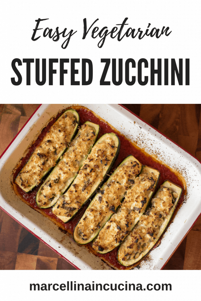 Baking tray with six Stuffed Zucchini halves with Ricotta in tomato sauce pin