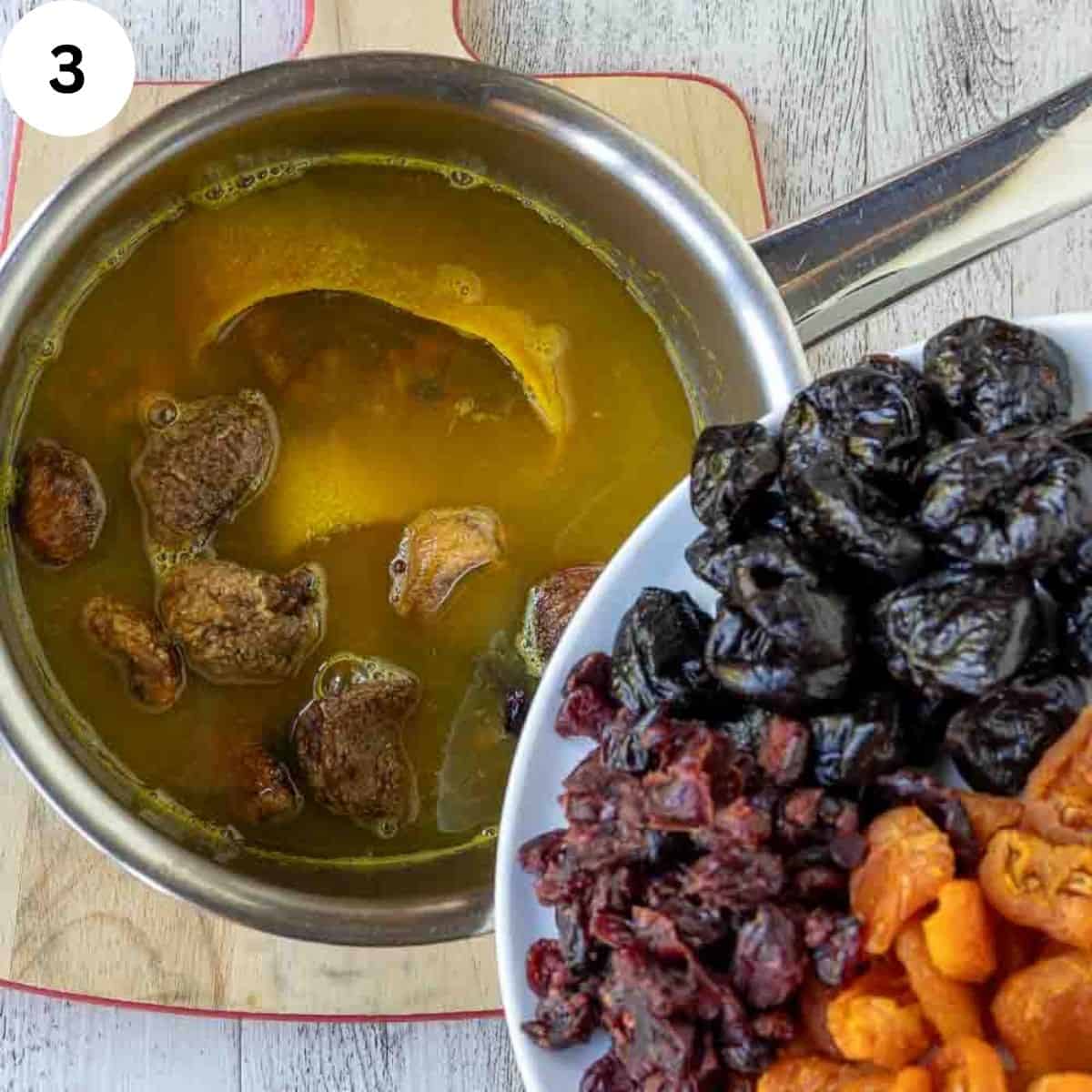 Adding dried fruit to liquid in a saucepan.