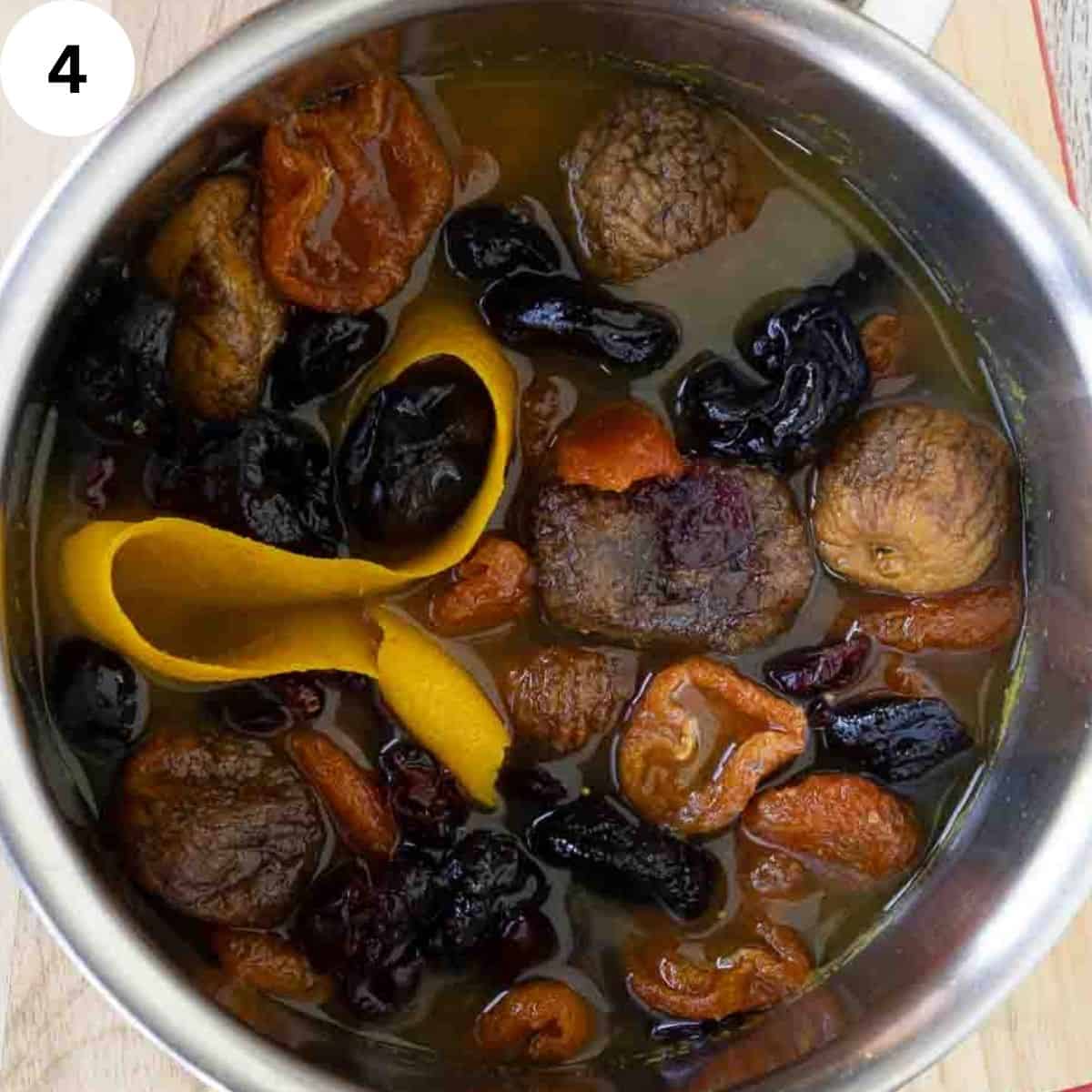 Stewed dried fruit in a saucepan viewed from above.