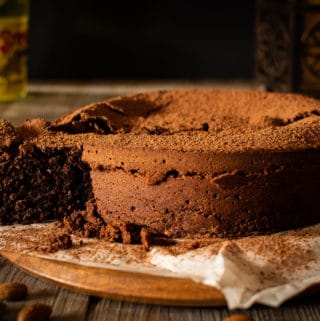 chocolate almond cake with a slice cut