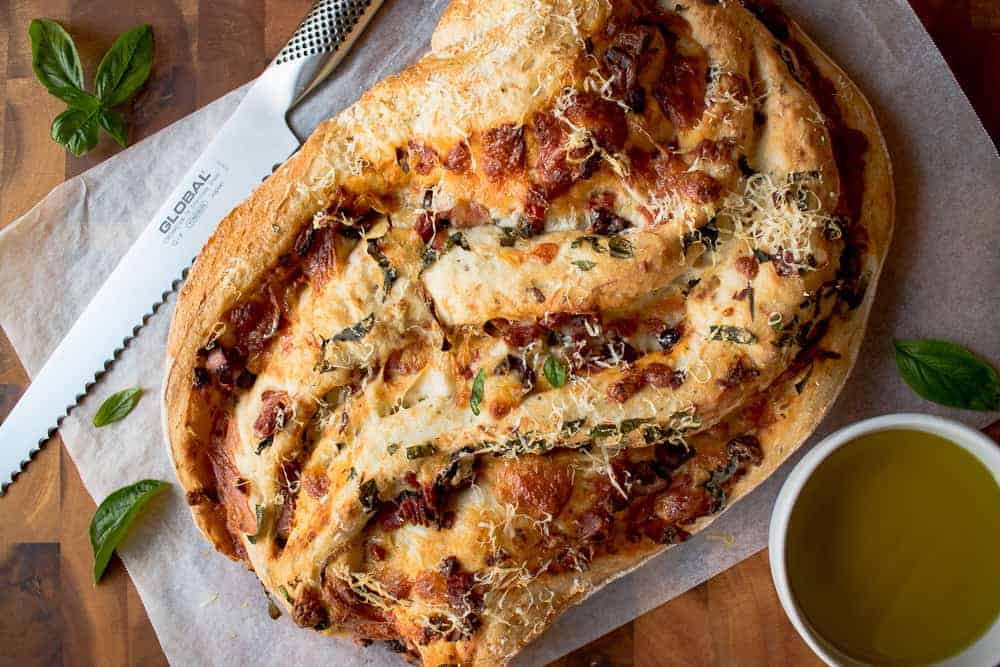 bread with swirled on pizza topping.