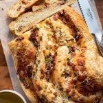 Baked Pizza Bread with two slices cut