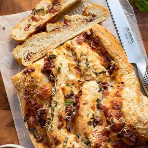 Baked Pizza Bread with two slices cut