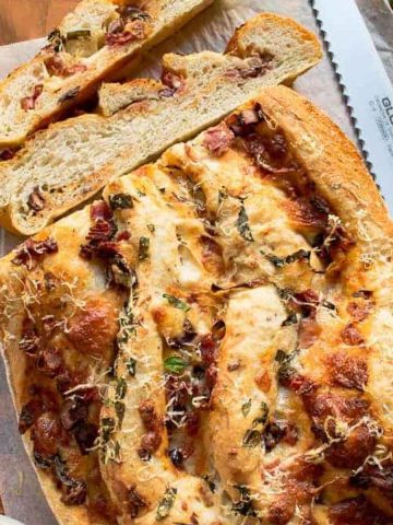 Baked Pizza Bread with two slices cut