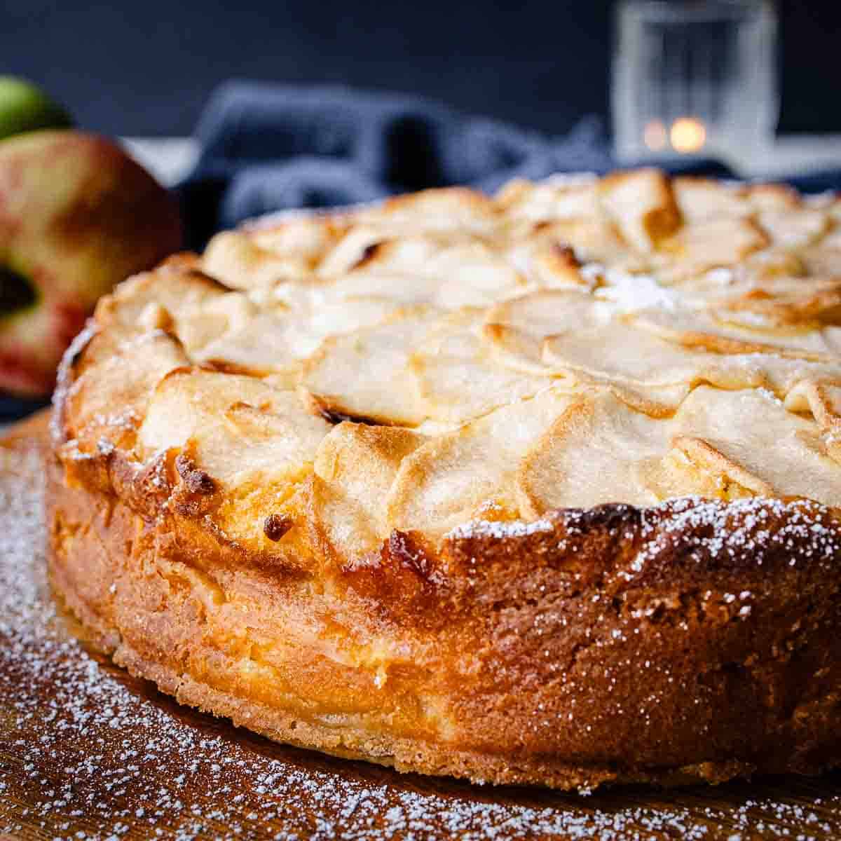 Italian Apple cake on a wooden board.