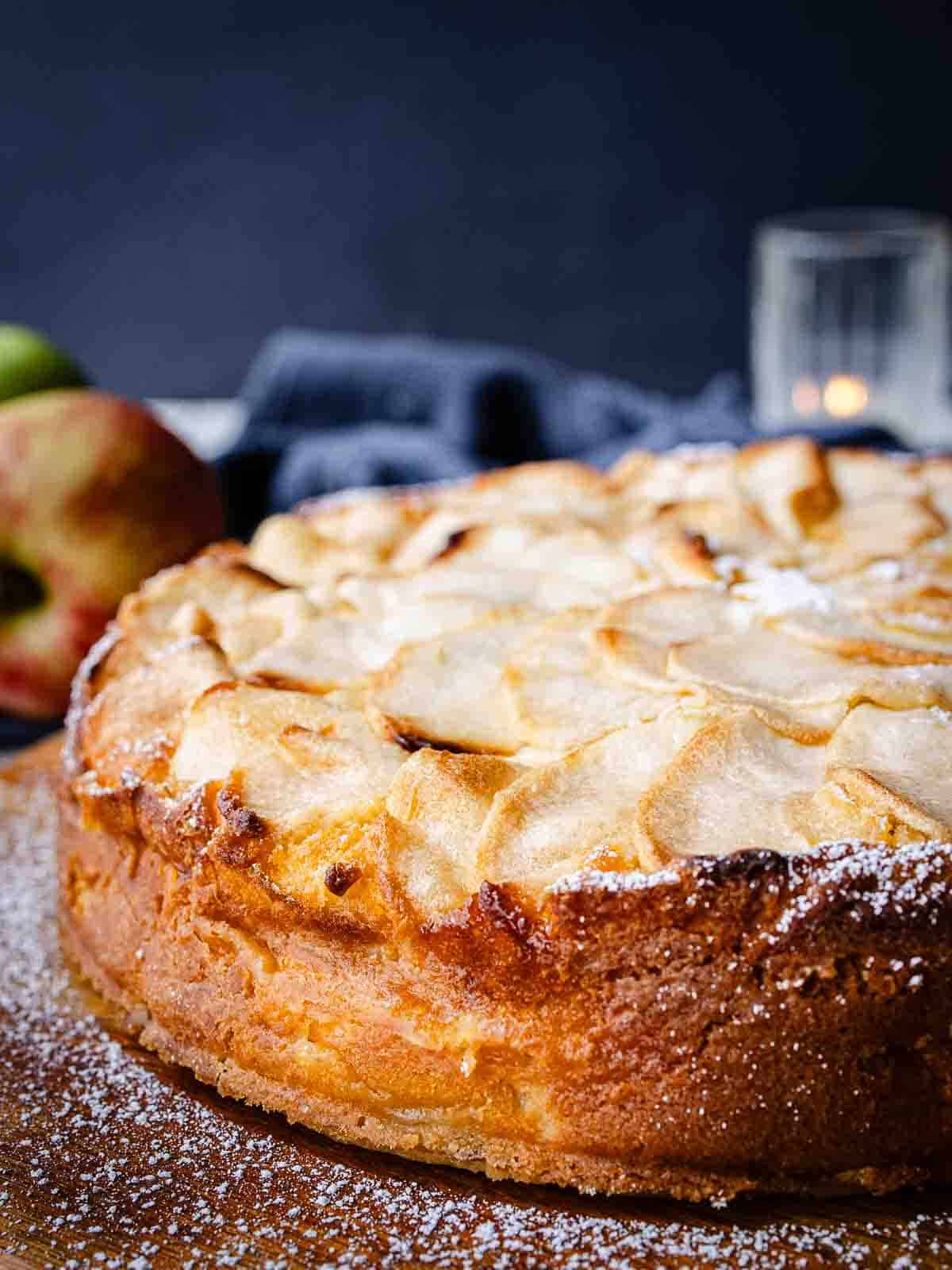 Italian Apple cake on a wooden board.