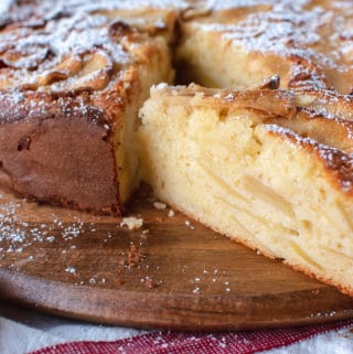 Apple cake with a slice cut