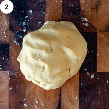 A ball of cookie dough viewed from above.