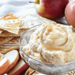 sweet ricotta on a board with apple slices and pizzelle