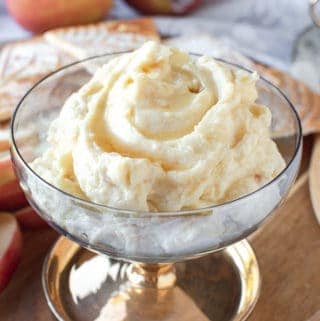 sweet ricotta on a board with apple slices and pizzelle