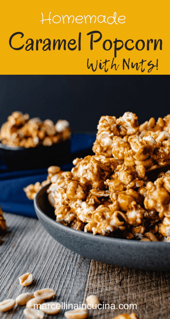 Caramel popcorn with nuts is a delicious and easy snack which everyone loves! #caramelcorn #bestcaramelcorn #caramelcornwithnuts #caramelpopcorn Homemade caramel popcorn in a grey bowl on blue cloth. smaller black bowl of caramel popcorn in background caramel popcorn and nuts on wooden table. close up