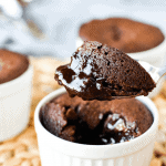 Close up of a spoonful of gooey baked chocolate pudding