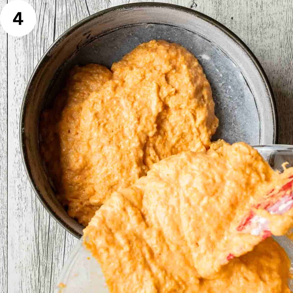 Pouring cake batter into round cake pan.