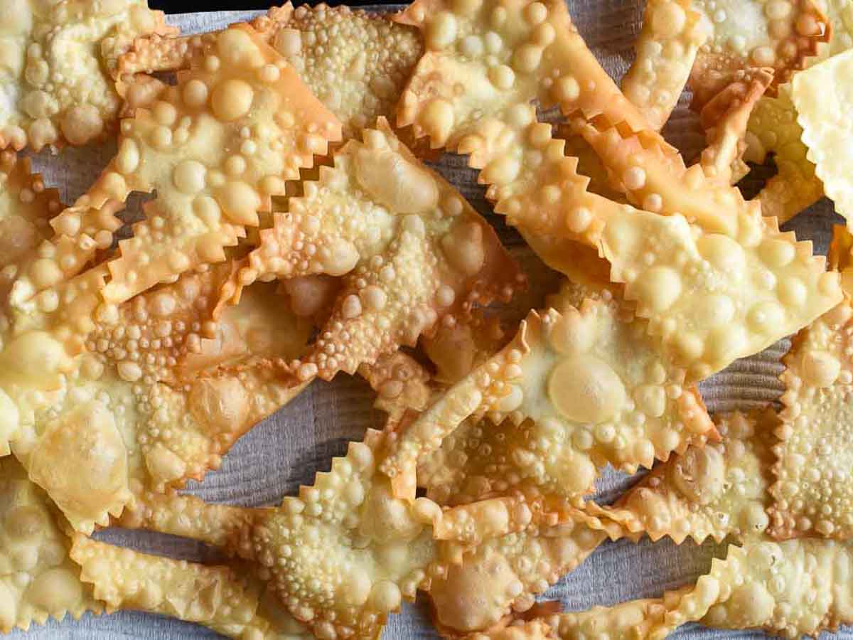 Fried and bubbled pastry strips viewed from above