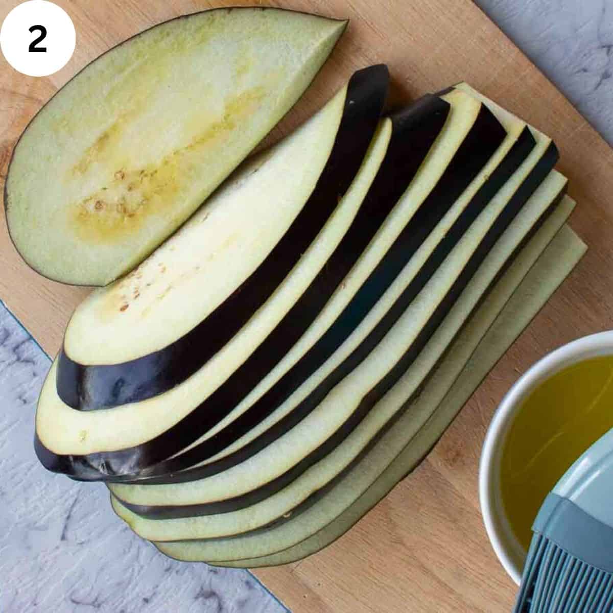 An eggplant sliced lengthwise.