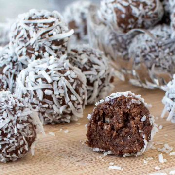 close up of rum balls including one cut in half