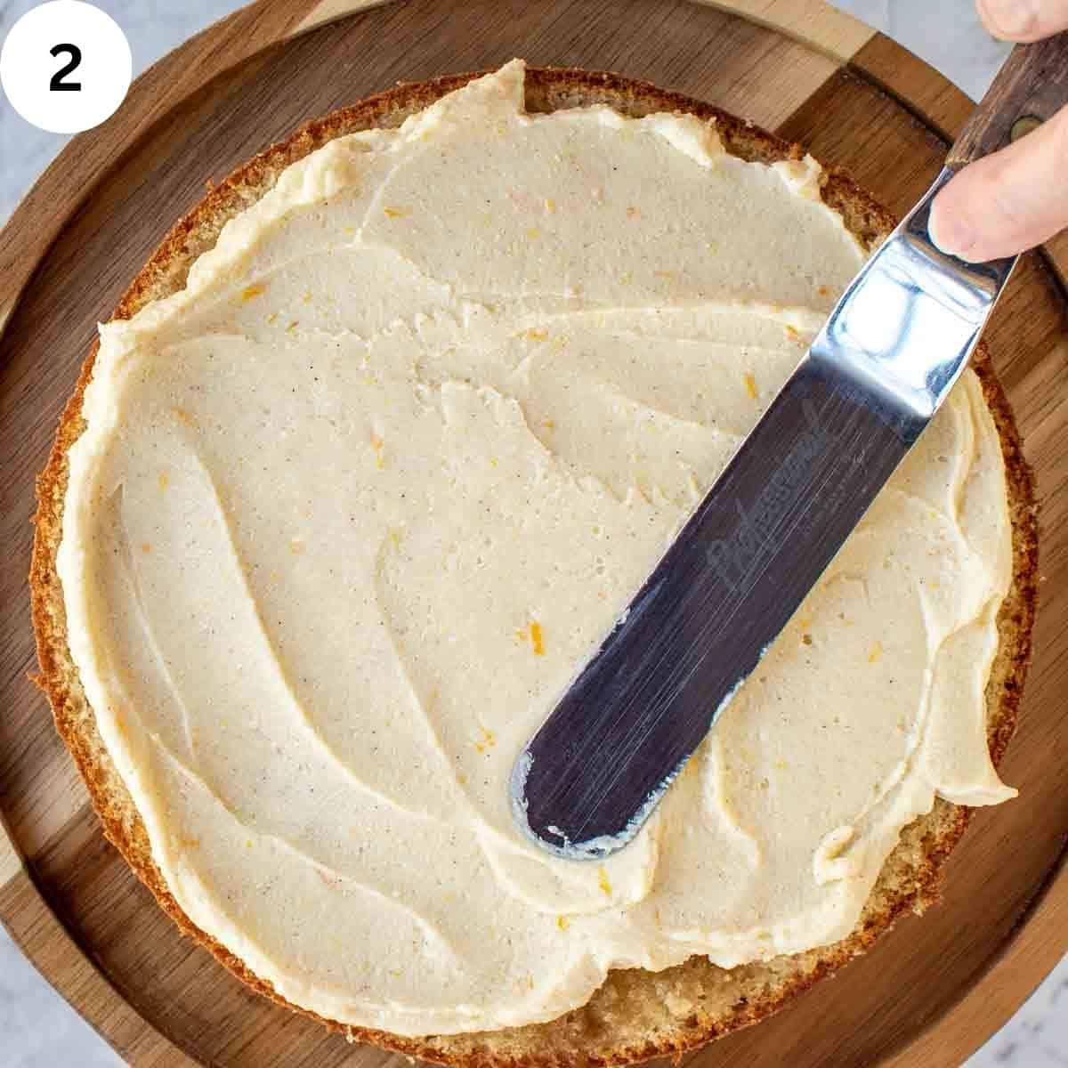 Cream being spread onto a cake.