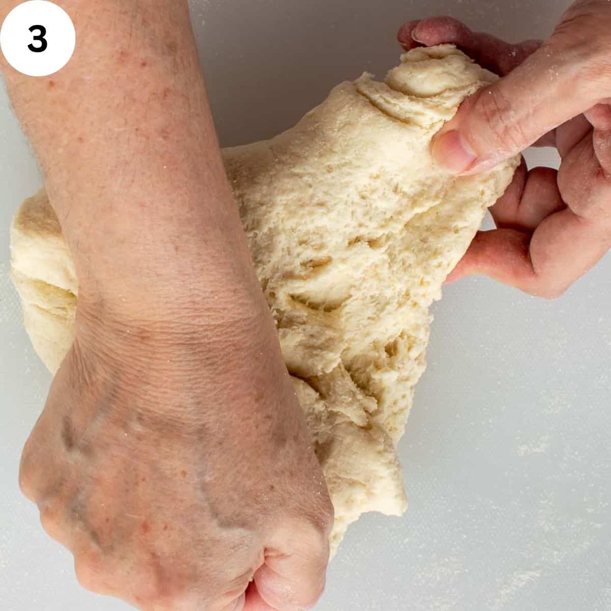 Kneading semolina pasta by hand.