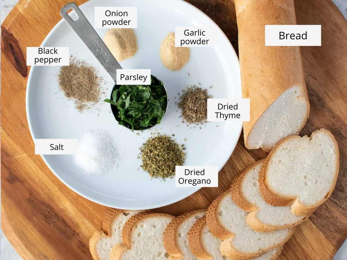 Ingredients required to make the recipe prepared on a wooden board. 