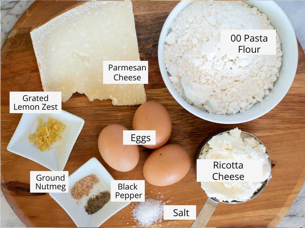 Labelled ingredients laid out on a wooden table.