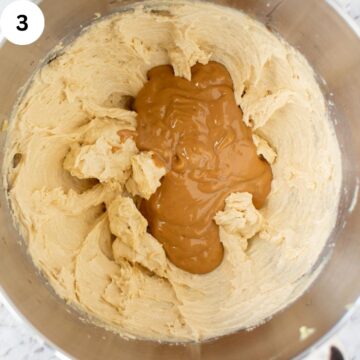 Peanut butter in the middle of a creamy mixture.