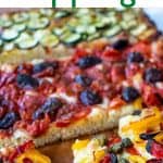 image with text. text reads super delicious focaccia toppings. image is rectangle bread topped with three different toppings.