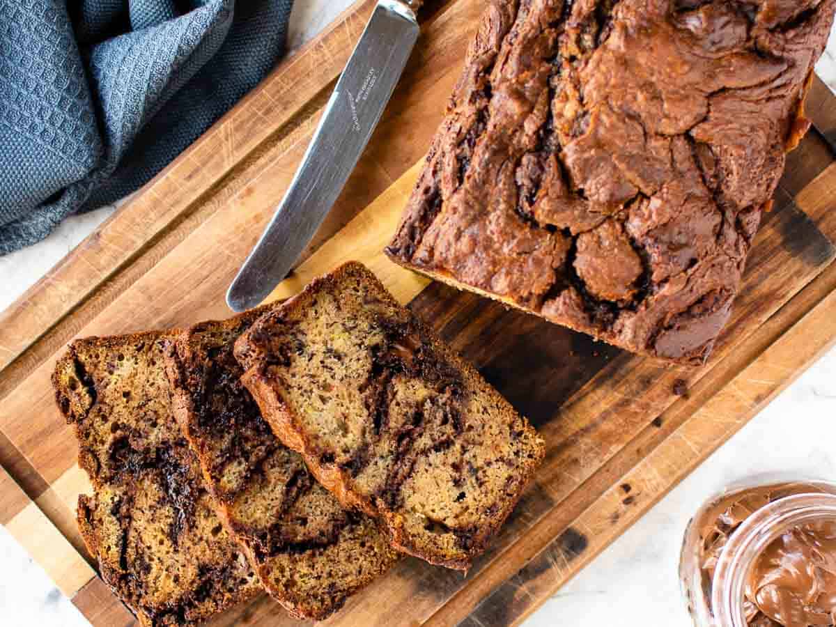 Chocolate swirled loaf with a few slices cut viewed from above.