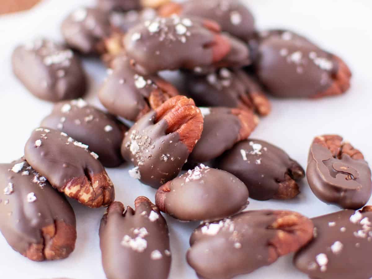 pile of pecans with a chocolate coating.