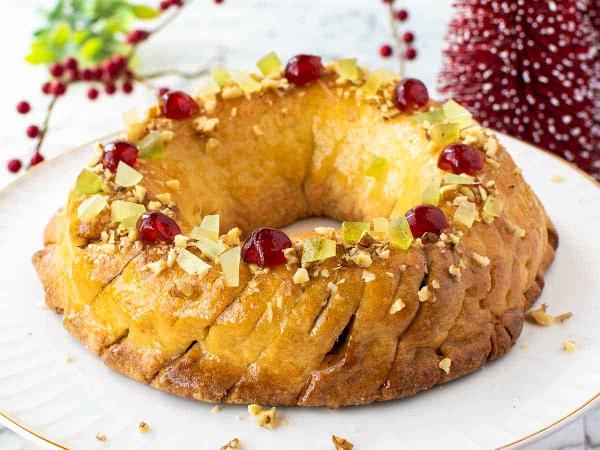 ring shaped pastry sprinkled with candied cherries, citron and nuts.
