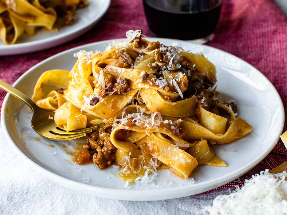 Close up of white plate with pasta on.