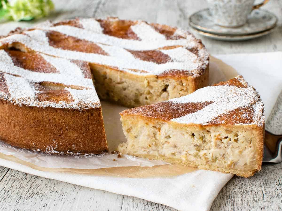 round pie with lattice top and a slice cut and turned to show the inside.