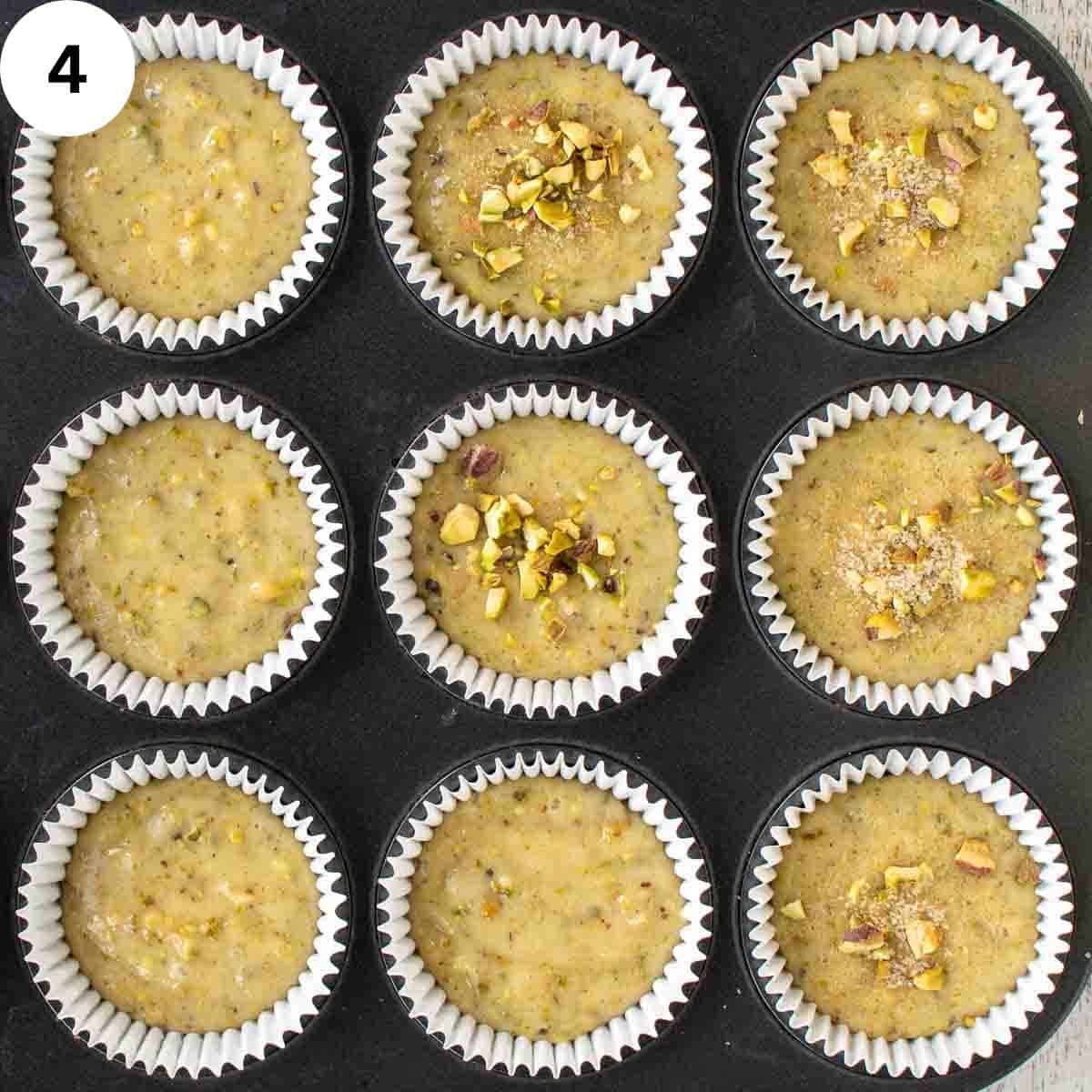 Muffins batter in muffin pans ready for baking.