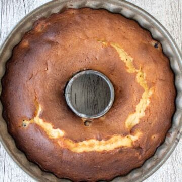 Baked cake in a bundt pan viewed from above.