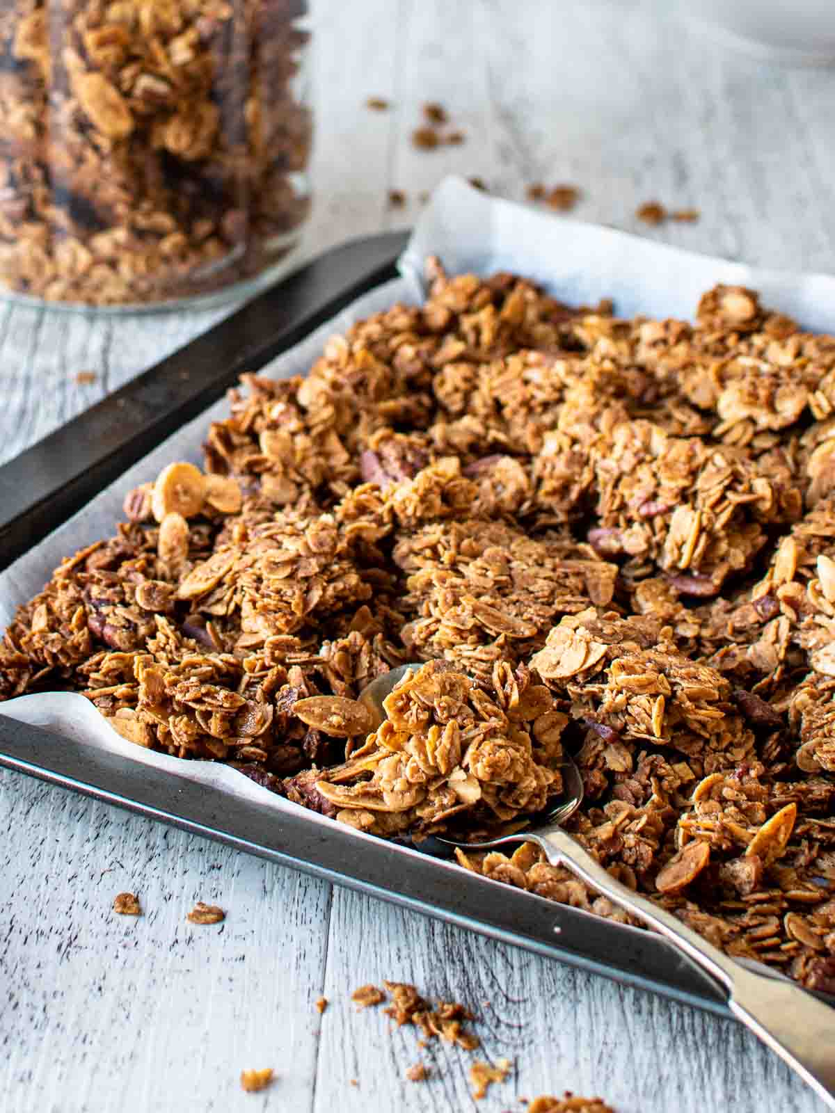 Cinnamon Granola clusters on a baking sheet.