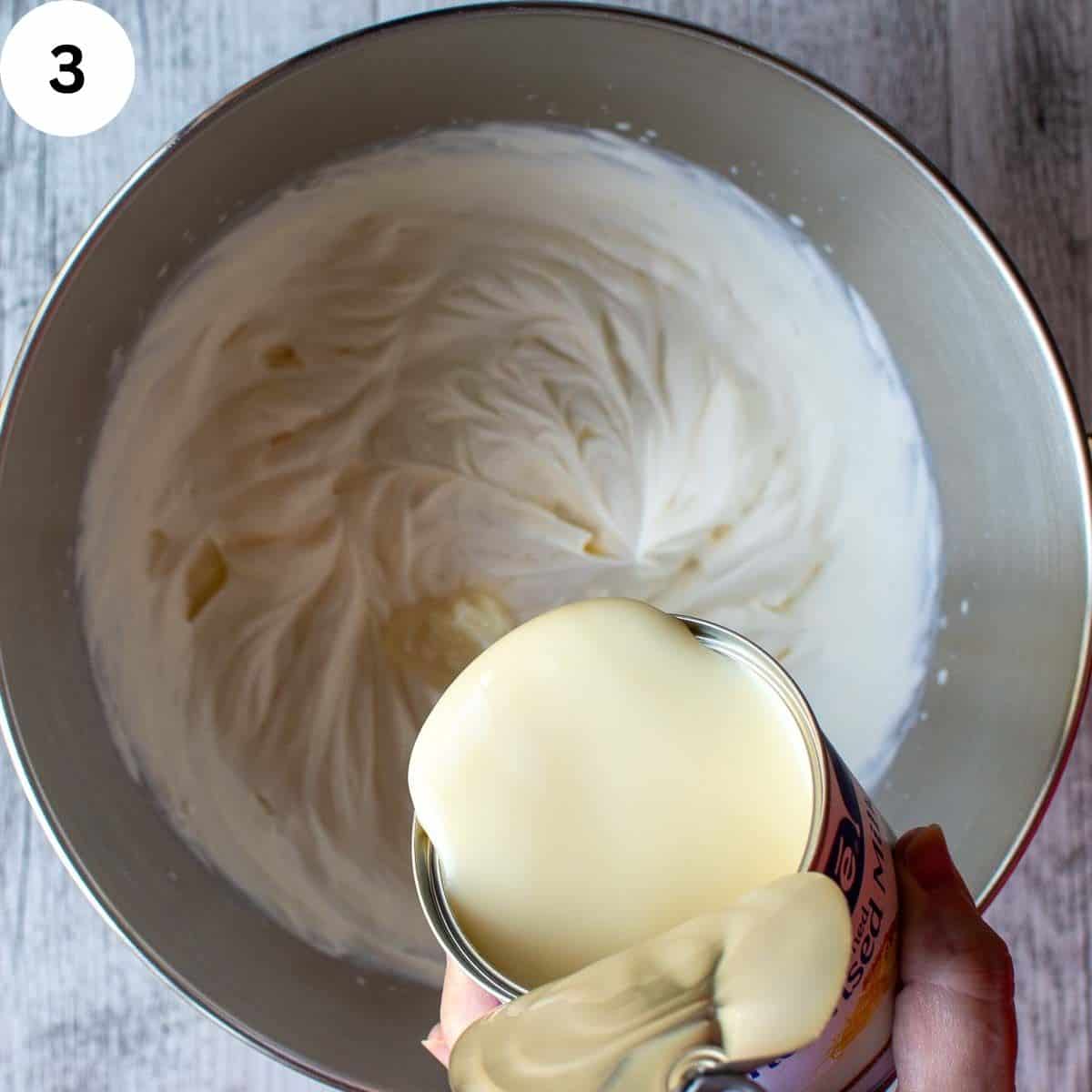 Condensed milk being poured into thick cream.