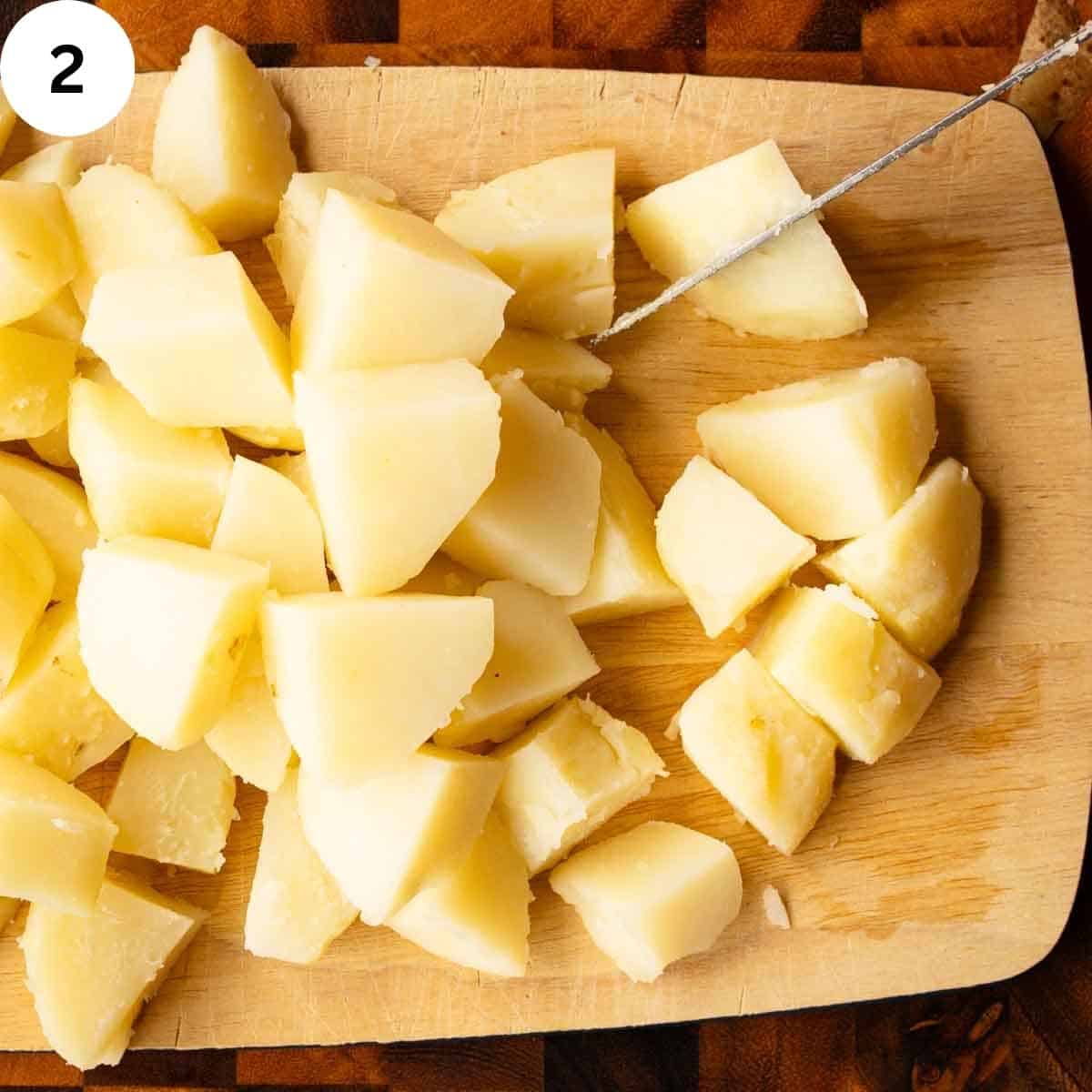Cooked, peeled potatoes cut into cubes.