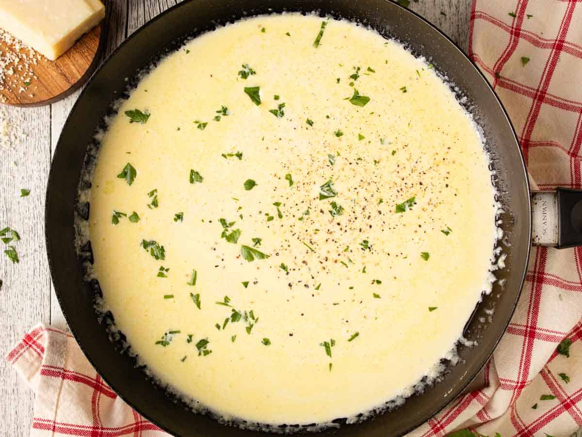 Creamy sauce with a sprinkle of chopped parsley.