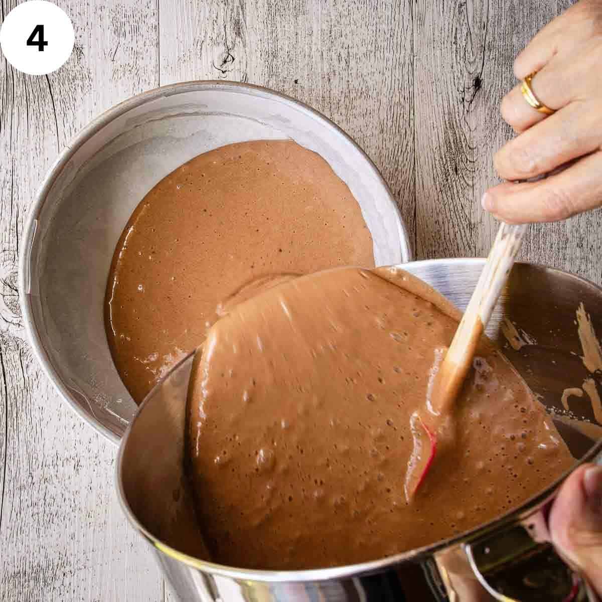 Pouring chocolate cake batter into cake pan.