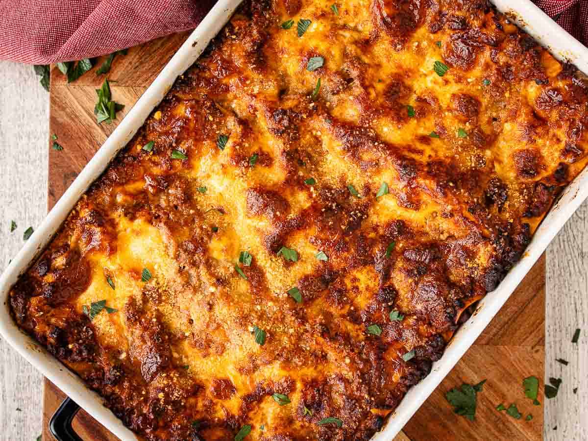 Baked Lasagna in a rectangle pan viewed from above.